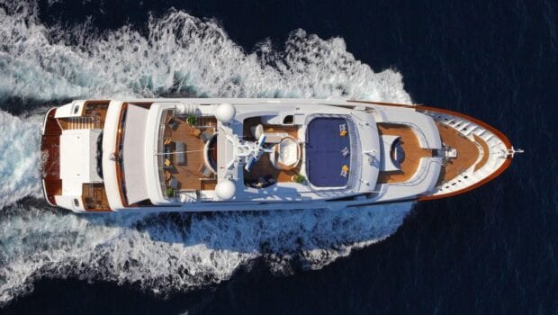 aerial of yacht cruising
